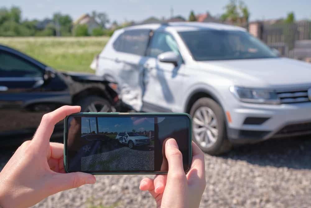 Taking Picture Of Cars In An Accident